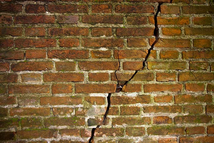 Crack in a brick wall caused by an earthquake